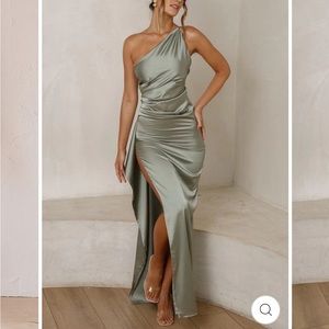 One shoulder dress with open back. NEVER WORN. Brand new. Jade color